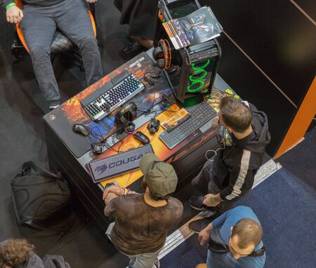 KYIV, UKRAINE - APRIL 13, 2019: People visit Cougar, gaming peripherals, components and computer...