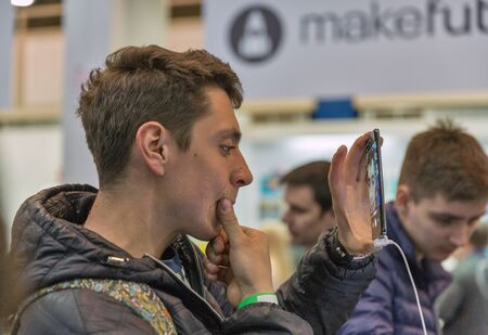 KYIV, UKRAINE - APRIL 06, 2019: People visit Samsung, a South Korean multinational conglomerate...