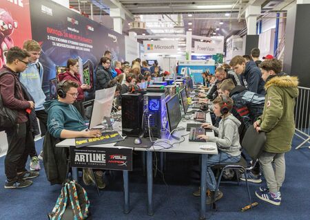 KYIV, UKRAINE - APRIL 13, 2019: Gamers participate in ArtLine tournament in game zone during CEE...