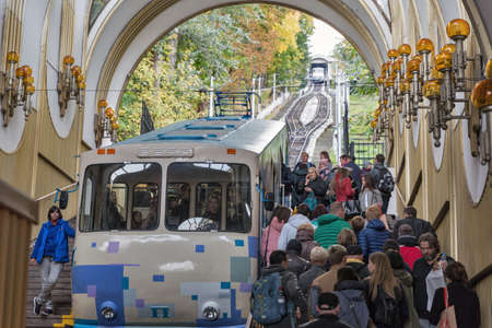 KYIV, UKRAINE - OCTOBER 05, 2019: People visit Kyiv funicular station. The funicular transports...