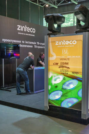 KYIV, UKRAINE - MAY 21, 2015: Zinteco TV studio design and engeneerin company booth on TV and Radio International Fair in ACCO EC, main annual business forum of media industry in Ukraine.のeditorial素材