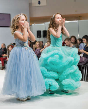 KYIV, UKRAINE - FEBRUARY 09, 2018: Fashion young little girls beautiful models at Kyiv Fashion 2018...