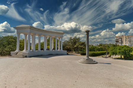 CHORNOMORSK, UKRAINE - AUGUST 08, 2020: People have a rest in Yuonost park and boulevard on a sunny summer day. Chornomorsk city with big industrial port is located around the Sukhyi Estuary.のeditorial素材