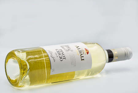 KYIV, UKRAINE - AUGUST 22, 2020: Studio shoot of Vina Albali Pinot Grigio Italian white wine bottle closeup against white background.のeditorial素材