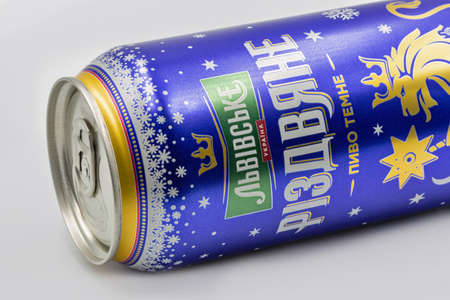 KYIV, UKRAINE - NOVEMBER 14, 2020: Lvivske Christmas Dark beer can closeup against white bacground. The brand Lvivske has always reflected Ukrainian traditions, values and its historical origin.のeditorial素材
