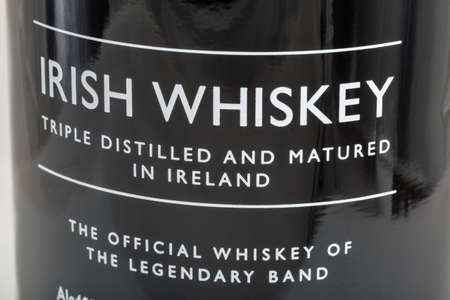 KYIV, UKRAINE - FEBRUARY 17, 2019: The Pogues blended Irish Whiskey triple distilled and matured bottle label closeup. It is the official whiskey of legendary rock band The Pogues.のeditorial素材