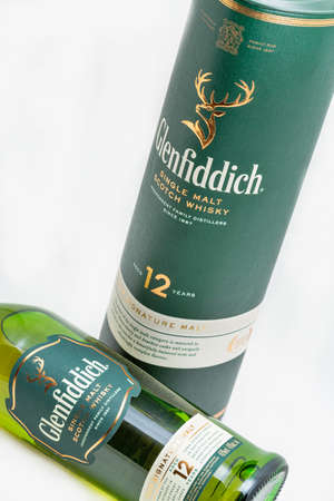 KYIV, UKRAINE - AUGUST 17, 2019: Bottle of Glenfiddich Scotch single malt whisky closeup against...