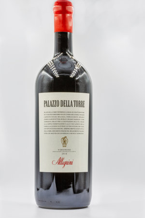 KYIV, UKRAINE - DECEMBER 17, 2020: Studio shoot of bottle of Allegrini Italian Palazzo della Torre Veronese red dry wine closeup against white.のeditorial素材