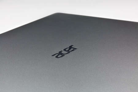 KIEV, UKRAINE - MARCH 02, 2021: Acer logo closeup on laptope metal surface. Acer is a Taiwan based...