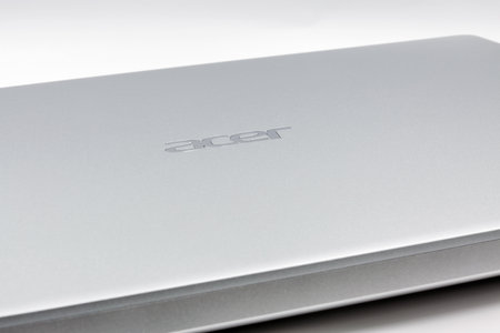 KIEV, UKRAINE - MARCH 02, 2021: Acer logo closeup on laptope metal surface. Acer is a Taiwan based...