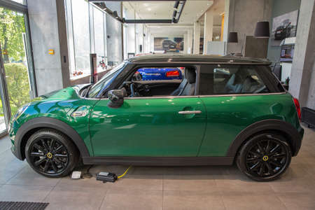 KYIV, UKRAINE - MAY 10, 2021: New MINI Cooper Electric car on display in BMW AWT Bavaria dealership...