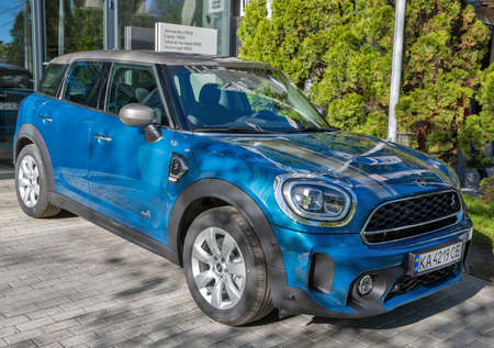 KYIV, UKRAINE - MAY 10, 2021: New MINI Cooper Countryman diesel car on display in BMW AWT Bavaria dealership company. Mini is a compact city car that was produced by the English British Motor Corp.のeditorial素材