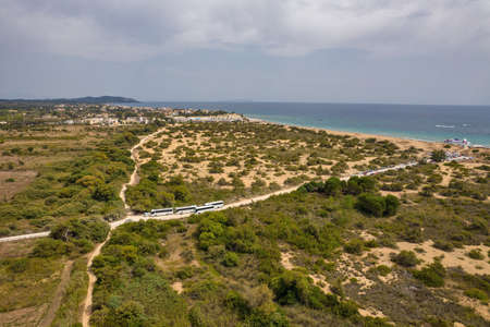 Aerial drone view over Issos beach close to Lake Korission. Agios Georgios Argirades in the distance. It is located in the southern part of Greek island of Corfu, Greece.の写真素材