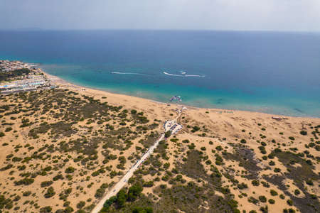 Aerial drone view over Issos beach close to Lake Korission. Agios Georgios Argirades in the...
