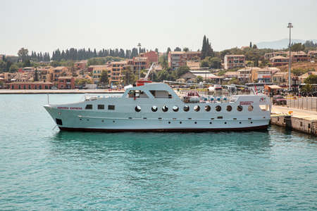Kerkyra, Corfu, Greece - July 30, 2021: View of passenger port with moored Joy Cruises Saranda Express ferry ship.のeditorial素材