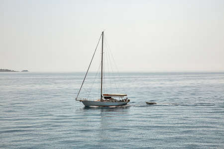 Sailing motor boat in Ionian Sea close to Corfu, Greece