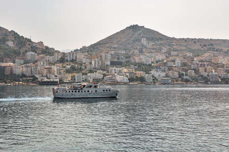 Saranda, Albania - July 30, 2021: Saranda Express by Joy Cruises ferry ship in harbour. Saranda is located on an open sea gulf of the Ionian Sea within the Mediterranean Sea.のeditorial素材