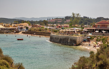 Sidari, Corfu, Greece - August 01, 2021: People swim and sunbath close to famous Canal D'amour.のeditorial素材