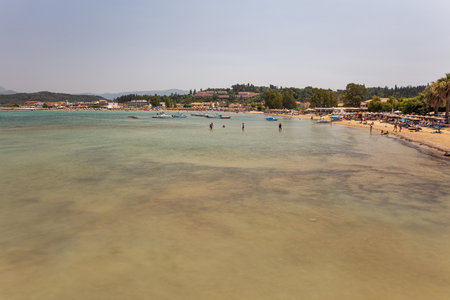 Sidari, Corfu, Greece - August 01, 2021: People relax on the beach at famous summer resort close to Canal D'amour. Sidari is a settlement in the northern part of the island of Corfu.のeditorial素材