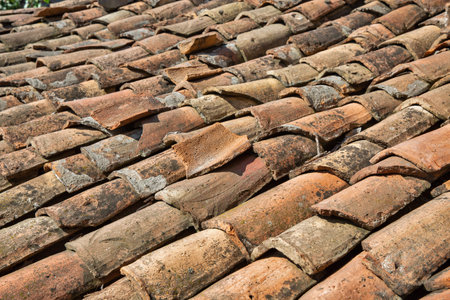 old weathered terracotta roof tile closeupの写真素材