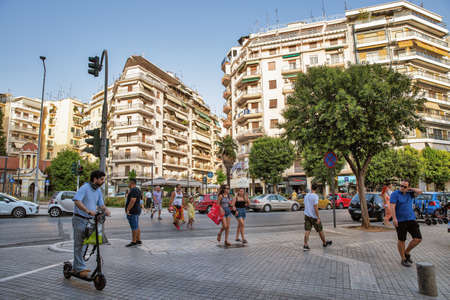Thessaloniki, Greece - July 27, 2021: People walk along Fanarioton Square. Thessaloniki is the second largest city in Greece and the capital of geographic region of Macedonia.のeditorial素材