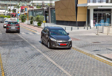 Ayia Napa, Cyprus - May 31, 2021: Traffic on Nissi Ave in downtown. Ayia Napa is a tourist resort at...