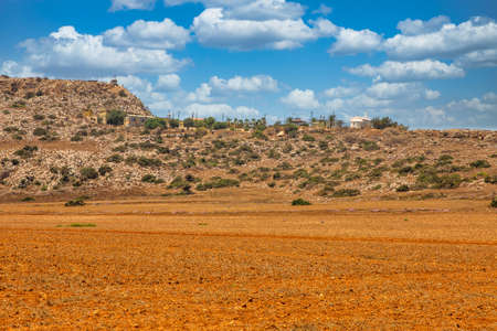 Landscape Cape Greco peninsula with radar station settlement of the British military base, Cyprus. It is mountainous peninsula with a national park, rock paths and turquoise lagoon.の写真素材