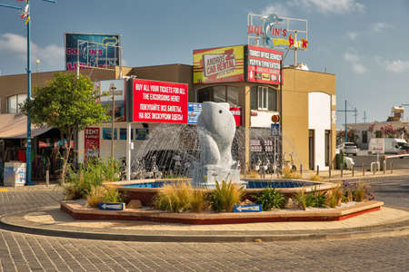 Ayia Napa, Cyprus - May 28, 2021: Fountain Lovers of Fish on the city centre of a resort town. Ayia Napa is a tourist resort at the far eastern end of the southern coast of Cyprus.のeditorial素材