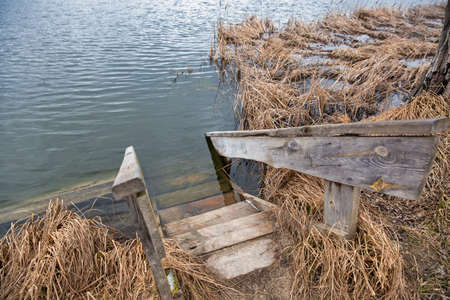 old wooden swimming ladder on Virlya lake closeup. Velyki Berezhtsi, Kremenets, Ternopil region, Ukraine.の写真素材