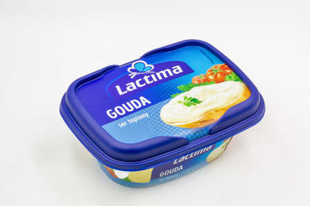 Kyiv, Ukraine - May 08,2021: Lactima Gouda processed cheese pack closeup against white. It is a processed cheese producer from Poland, based in Masurian province, known as a thousand lakes area.のeditorial素材