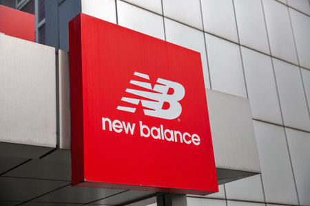 Kyiv, Ukraine - April 27, 2022: New Balance logo closeup outdoors. New Balance is one of the world's...