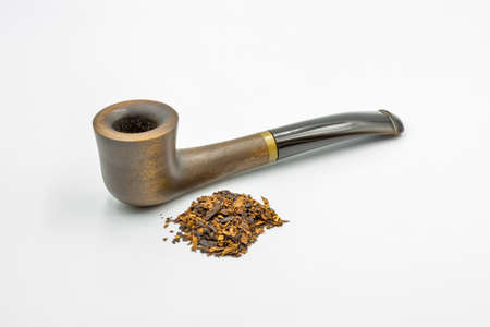 Wooden pipe for tobacco smoking closeup against white