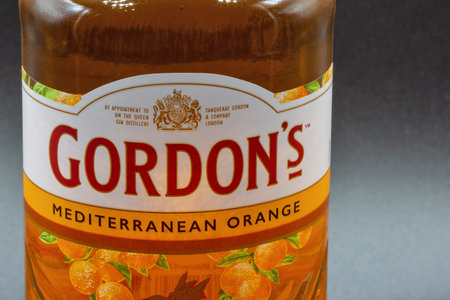 Kyiv, Ukraine - February 08, 2023: Gordons Mediterranean Orange gin bottle label closeup against...