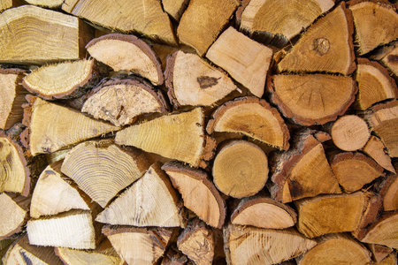 interior background of sawn firewood closeup