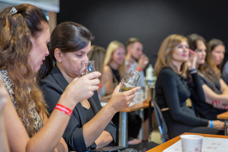 Kyiv, Ukraine - September 30, 2023: People visit tasting during Be Wine International Wine Show.