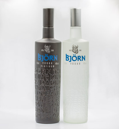 Kyiv, Ukraine - July 14, 2022: Studio shoot of Bjorn Polish vodka bottles closeup against white.のeditorial素材