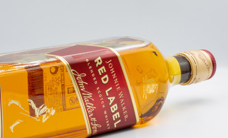 Kyiv, Ukraine - July16, 2022: Johnnie Walker Red Label blended Scotch Whisky bottle closeup. It is the most widely distributed brand of blended Scotch whisky in the world, sold in almost every countryのeditorial素材
