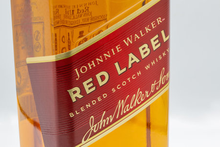 Kyiv, Ukraine - July16, 2022: Johnnie Walker Red Label blended Scotch Whisky bottle label. It is the most widely distributed brand of blended Scotch whisky in the world, sold in almost every countryのeditorial素材