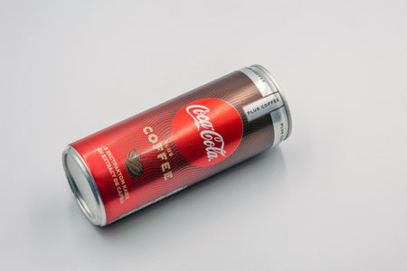 Kyiv, Ukraine - January 08, 2023: Studio shoot of Coca-Cola plus coffee can closeup against white. It is a carbonated soft drink with a cola flavor manufactured by the Coca-Cola Company.のeditorial素材