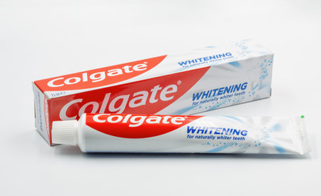 Kyiv, Ukraine - December 23, 2023: Colgate fluoride Whitening toothpaste pack closeup. Colgate is a...