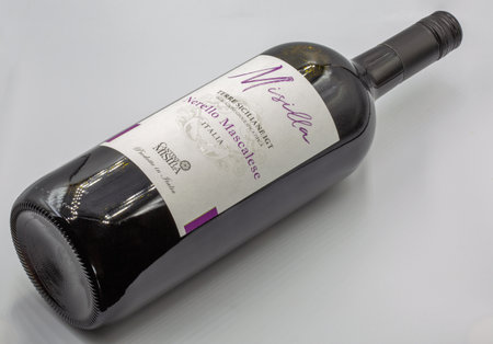 Kyiv, Ukraine - June 09, 2023: Studio shoot of Misilla Nerello Mascalese Sicilia IGT red dry wine bottle closeup against white background.のeditorial素材