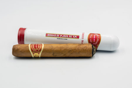 Kyiv, Ukraine - July 16, 2022: Studio shoot of cigar Romeo Y Julieta, Cuban premium quality. Metal...