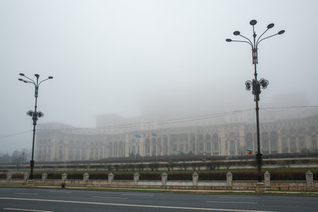 Constitution Square with Palace of the Parliament during heavy fog in winter. Bucharest, Romania.の写真素材