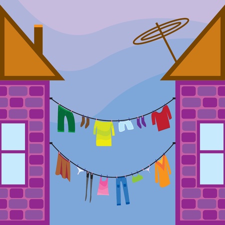 Washed clothes on a line between the housesのイラスト素材