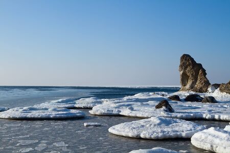 seascape with rocks and iceの写真素材