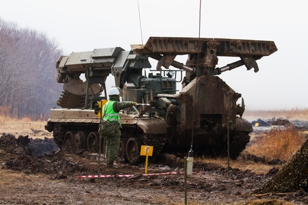 BOLSOI KAMEN, RUSSIA, - APRIL 3, 2013: Military exercises on emergency response in case of accidents at radiation-hazardous objects, Bolsoi Kamen, Russia, April 3, 2013. The military equipment.のeditorial素材