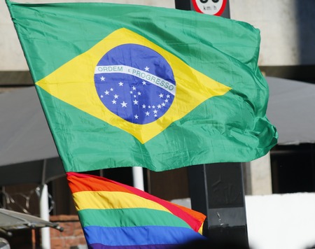 SAO PAULO, BRAZIL - June 7, 2015: brazilian and rainbow flag in the 19th Gay Pride Parade Sao Pauloのeditorial素材