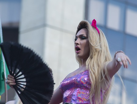 SAO PAULO, BRAZIL - June 7, 2015: An unidentified Drag Queen dressed in a costume celebrating lesbian, gay, bisexual, and transgender culture in the 19th Gay Pride Parade Sao Pauloのeditorial素材