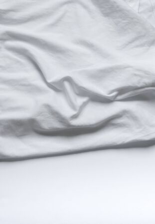 Crumpled white fabric cloth textureの写真素材