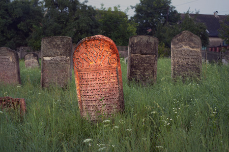 Ukraine, Galich- 24, July, 2015: At the Karaite cemetery in the village Zalukva near Galich (Ivano-Frankivsk region, Ukraine) remained around 200 gravestone monuments. The oldest of them dated from the mid-XVIII centuryのeditorial素材